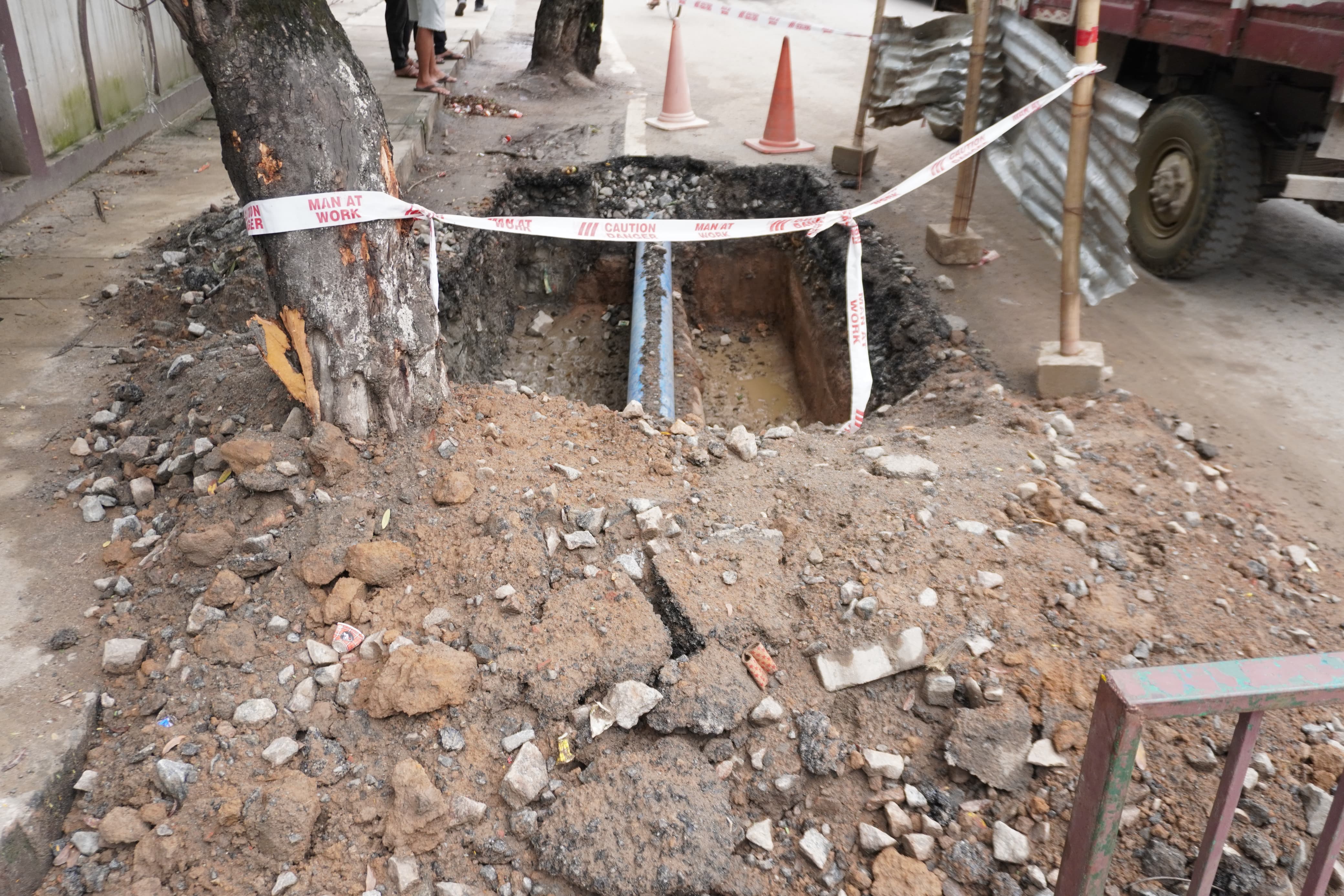 Construction for laying pipeling in a Guwahati Street under limbo.