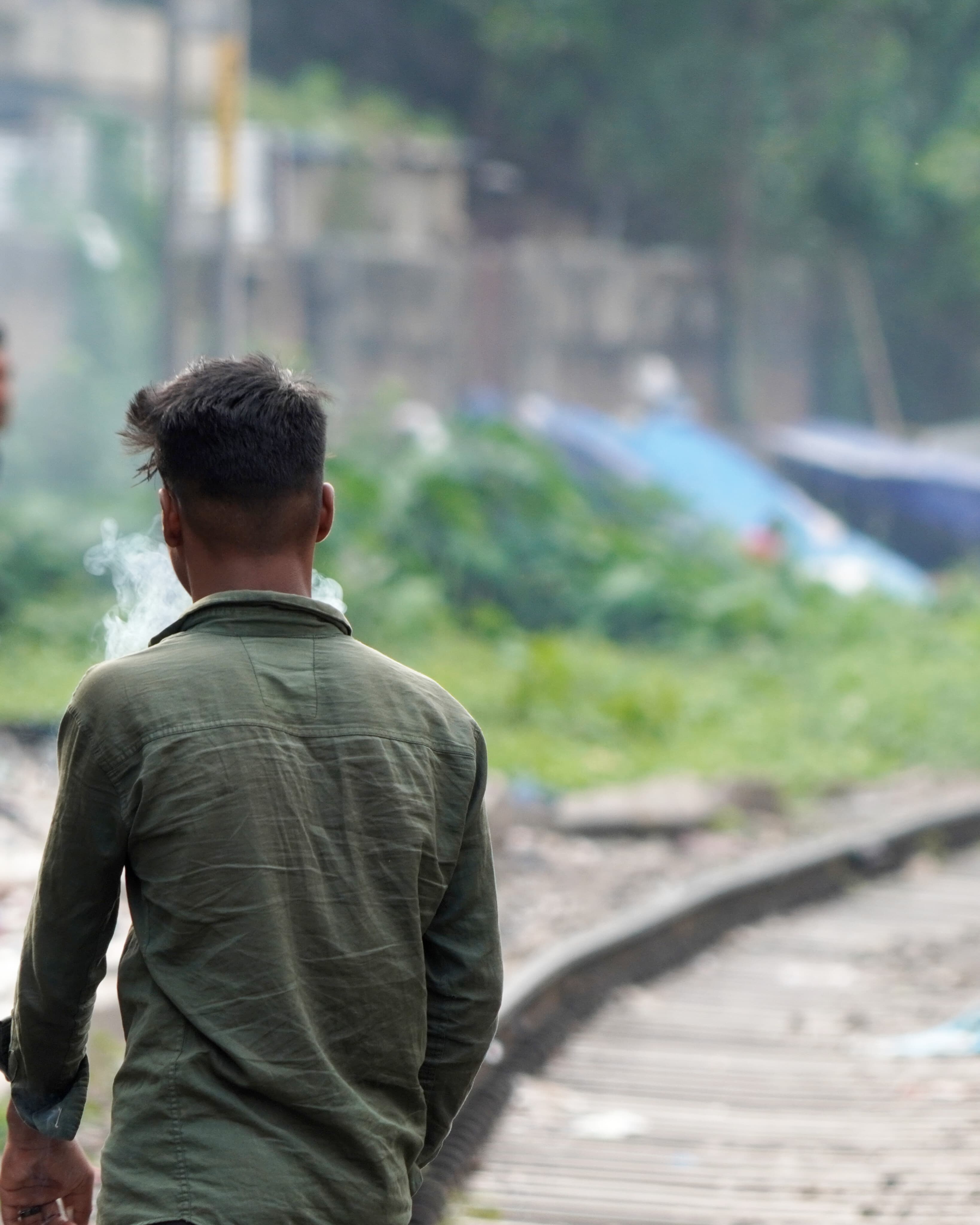 A boy smoking in Guwahati.
