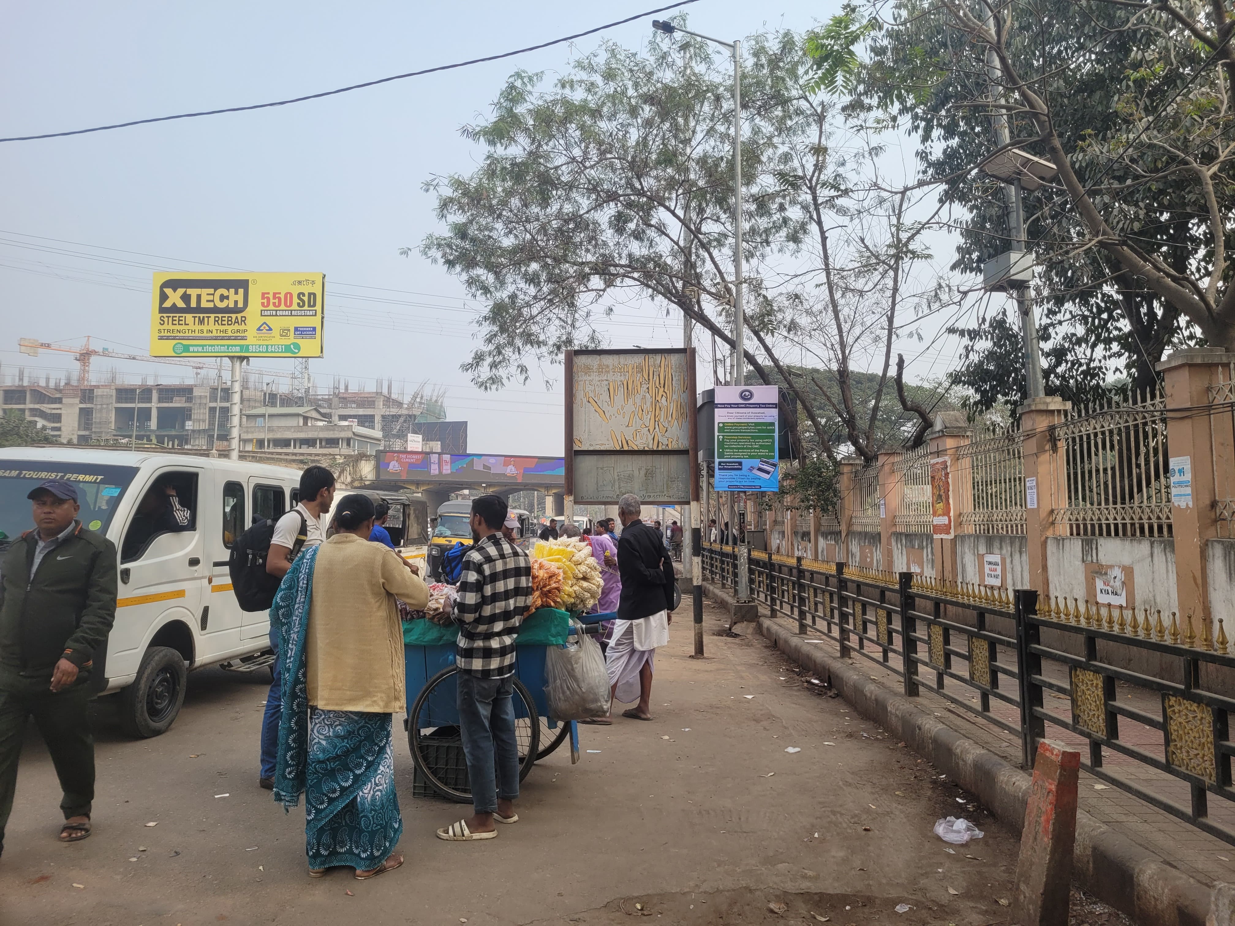 People buying from street vendors in Guwahati.