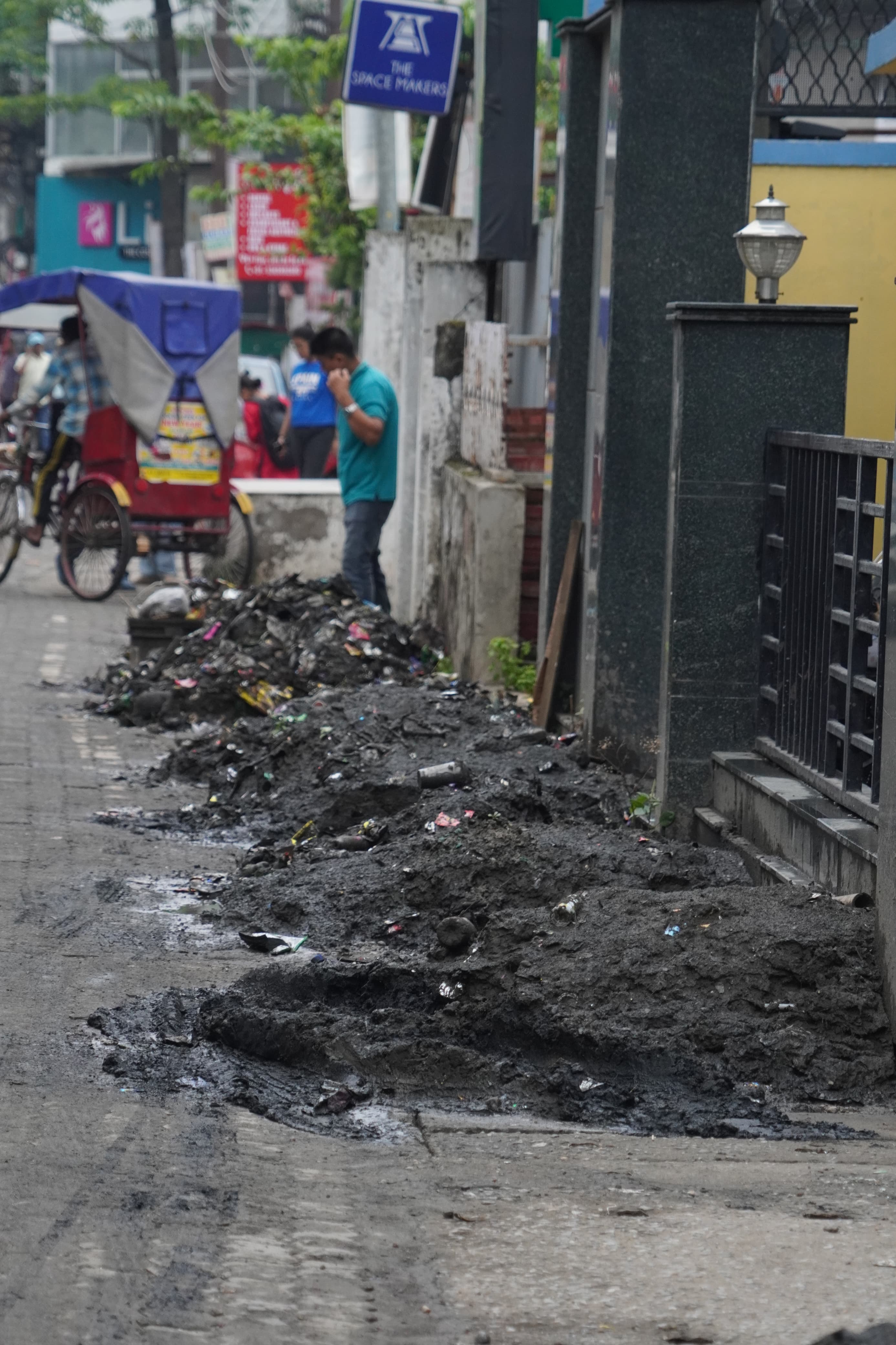 Roadside silt left lying dormant in a street of Guwahati.